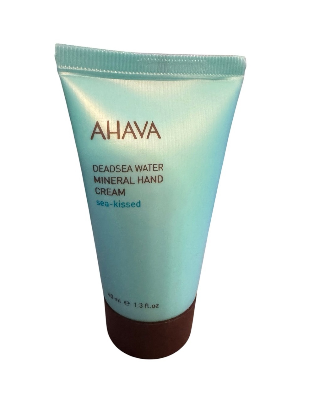 AHAVA Sea-Kissed Mineral Hand Cream - Light Teal Tube 1/3 fl. oz.